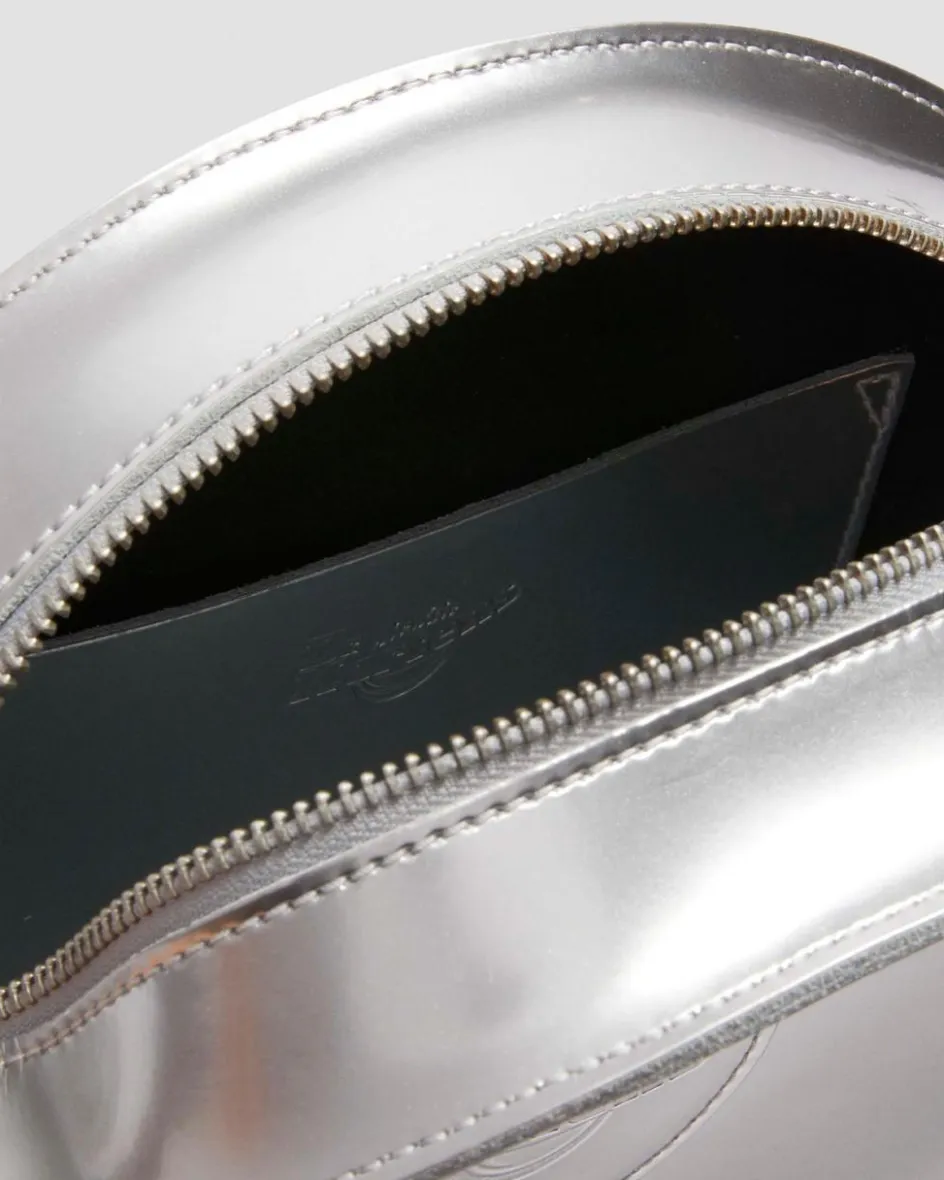 Dr. Martens Last Chance Styles|Last Chance Styles*Metallic Round Backpack in Silver Metallic Silver Metallic — Patent Lamper