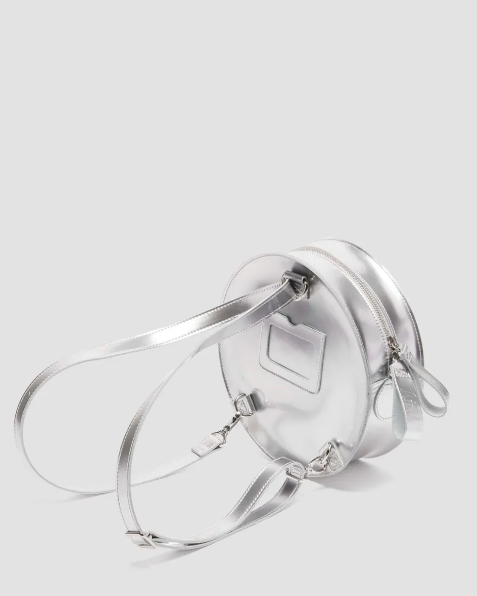 Dr. Martens Last Chance Styles|Last Chance Styles*Metallic Round Backpack in Silver Metallic Silver Metallic — Patent Lamper